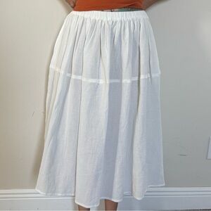 Suzi Kondi White A-Line Midi Skirt with Pleated Tiered Design